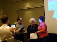LaDonna Olmstead receiving her Certified Tea Specialist certificate with Kyle Stewart and Jennifer Petersen in San Francisco, CA