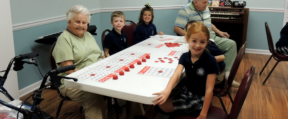 students playing bingo at assisted living 