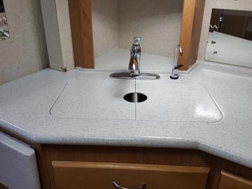 Corian countertop after repair and refinish with Stone Accent Finish