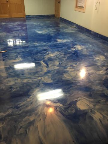 blue epoxy floor matching baseboards