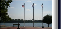 View of flags in front on lake