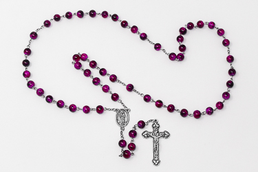 Pink Plastic Rosary Beads.